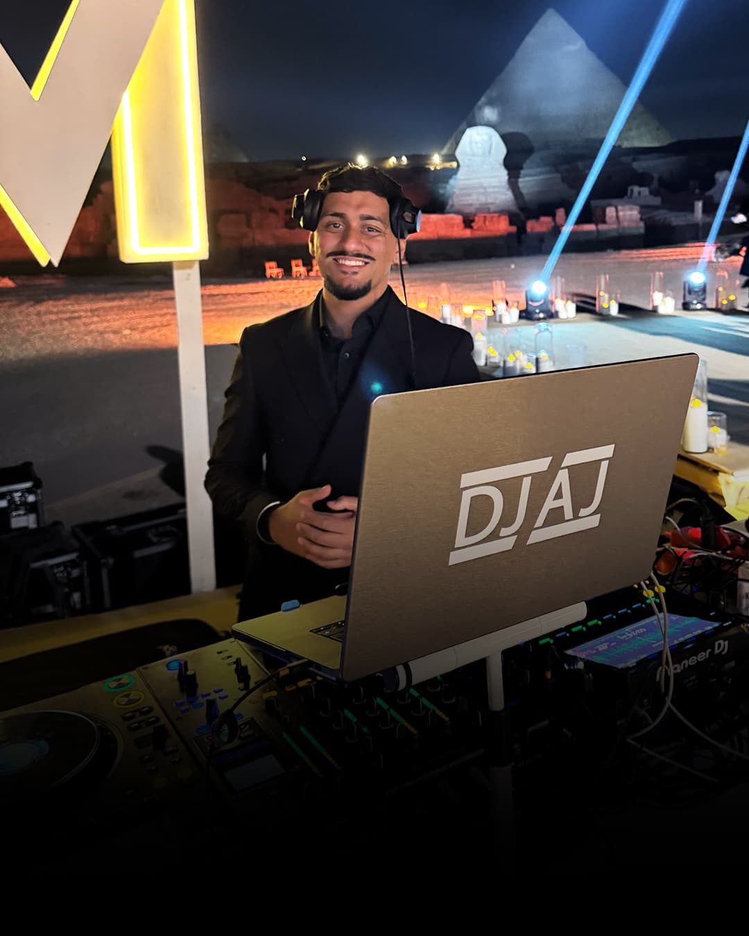 DJ AJ performing beside the Great Sphinx and Pyramids of Giza