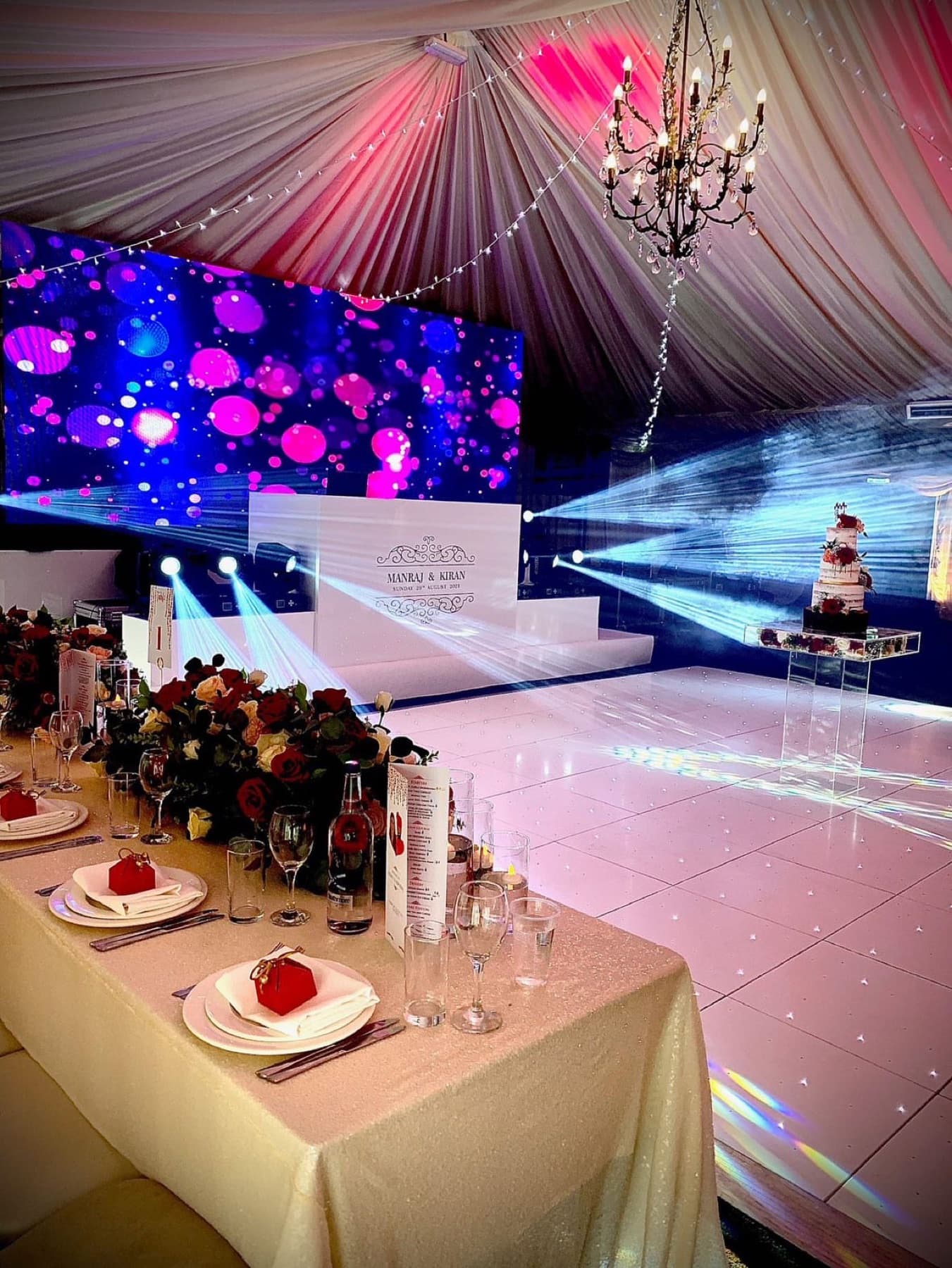 Elegant wedding production setup with lighting, LED screens and professional sound